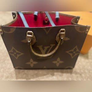 Louis Vuitton MM On The Go Small Purse